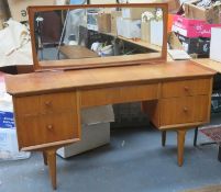 Vesper by Gimson and Slater mid 20th century teak dressing table. Approx. 119cm H x 103cm W x 46cm D