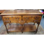 Late 19th/ Early 20th century oak welsh style kitchen dresser base, fitted with three drawers and
