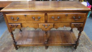 Late 19th/ Early 20th century oak welsh style kitchen dresser base, fitted with three drawers and