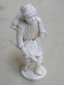 Late 19th century sectional ivory figure depicting a workman. Approx. 17cm high