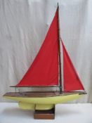 Early 20th century model pond yacht on display stand. Approx 103 x 83cm