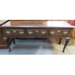 18th/19th century oak welsh style kitchen dresser base, fitted with three drawers, on cabriole