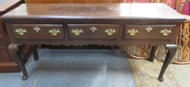 18th/19th century oak welsh style kitchen dresser base, fitted with three drawers, on cabriole