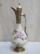 Victorian style ceramic ewer with cover, hand painted and heavily gilded with floral decoration