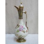 Victorian style ceramic ewer with cover, hand painted and heavily gilded with floral decoration