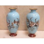 Pair of 19th century Japanese cloisonne vases, decorated with cranes and floral arrangements.