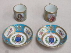 Pair of 18th century Sevres cabinet cups and saucers, hand painted and gilded throughout with panels