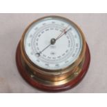Vintage brass and glass circular wall mounting barometer, stamped KH to face, Approx. 19cms diameter