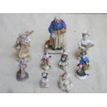 Parcel of mostly 19th century European hand painted and gilded ceramic figures, various makers