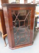 19th century mahogany astrogal glazed wall mounting corner cabinet