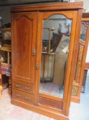 Edwardian mahogany inlaid two door wardrobe, fitted with two drawers to front