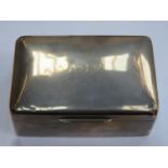 Hallmarked silver cigarette box by Walker and Hall, Birmingham assay dated 1945. Total Weight