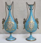 Pair of 19th century french style ceramic vases, with gilded and raised enamelled decoration, with