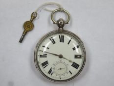 Victorian hallmarked silver pocket watch, with enamelled circular dial, roman numerals, and engraved