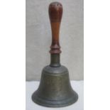 Victorian brass fire bell, with turned wooden handle. Approx. 32cm high