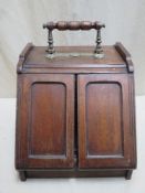 19th century mahogany coal scuttle, with articulated handled doors