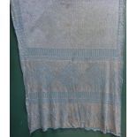 early 20th century blue and silver thread shawl, circa 1930s, with symmetric bands of decoration.