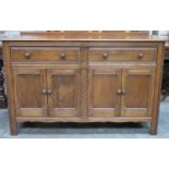 Ercol mid 20th century sideboard. Approx. 90cm H x 146cm W x 49.5cm D