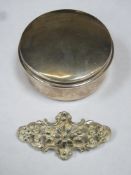 Hallmarked silver cylindrical storage box with cover. Approx 61.2g. Also white metal piercework