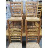 Set of six 19th/20th century oak rush seated ladderback chairs, on stretchered supports