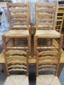 Set of six 19th/20th century oak rush seated ladderback chairs, on stretchered supports