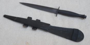 1950's/60's Commando knife, with leather scabbard, blade approx. 30cm, scabbard approx. 33.5cm