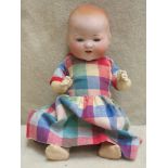 Armand Marseille, German bisque headed doll, with articulated sleeping eyes. Approx. 26cm high. Also