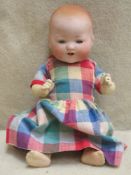 Armand Marseille, German bisque headed doll, with articulated sleeping eyes. Approx. 26cm high. Also