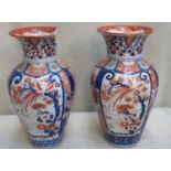 Pair of 19th century Oriental glazed ceramic vases, decorated in the typical Imari palette.