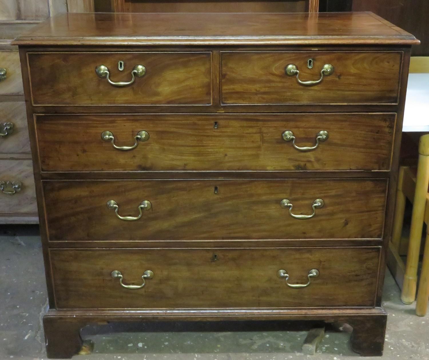 19th century mahogany two over three chest of drawers. Approx. 124cm H x 110cm W x 52cm D