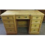 Early 20th century stripped pine nine drawer kneehole writing desk. Approx. 73cm H x 115cm W x 49.