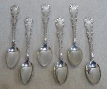 Set of six ornately decorated sterling silver spoons. Approx. 249.1g