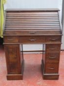 Small oak roll top desk. Approx. 88cm H x 70cm W x 61cm D