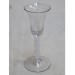 18th / 19th century inverted bell form wine glass, with air twist stem. Approx. 17cms height.