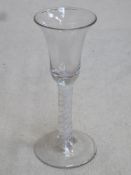 18th / 19th century inverted bell form wine glass, with air twist stem. Approx. 17cms height.