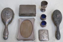 Parcel of hallmarked silver including photo frame, cigarette case, open salts, dressing brushes, egg