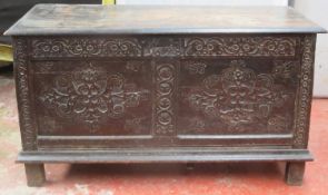 Heavily carved fronted oak blanket chest. Approx. 67cm H x 122cm W x 50cm D