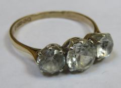 9ct gold ladies dress ring set with three clear stones