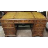 Mid 20th century mahogany pedestal eight drawer writing desk, fitted with green leather effect