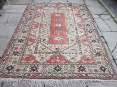 Decorative Middle Eastern style floor rug. Approx. 300cms L x 197cms W