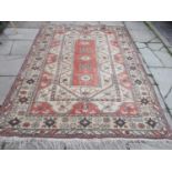 Decorative Middle Eastern style floor rug. Approx. 300cms L x 197cms W