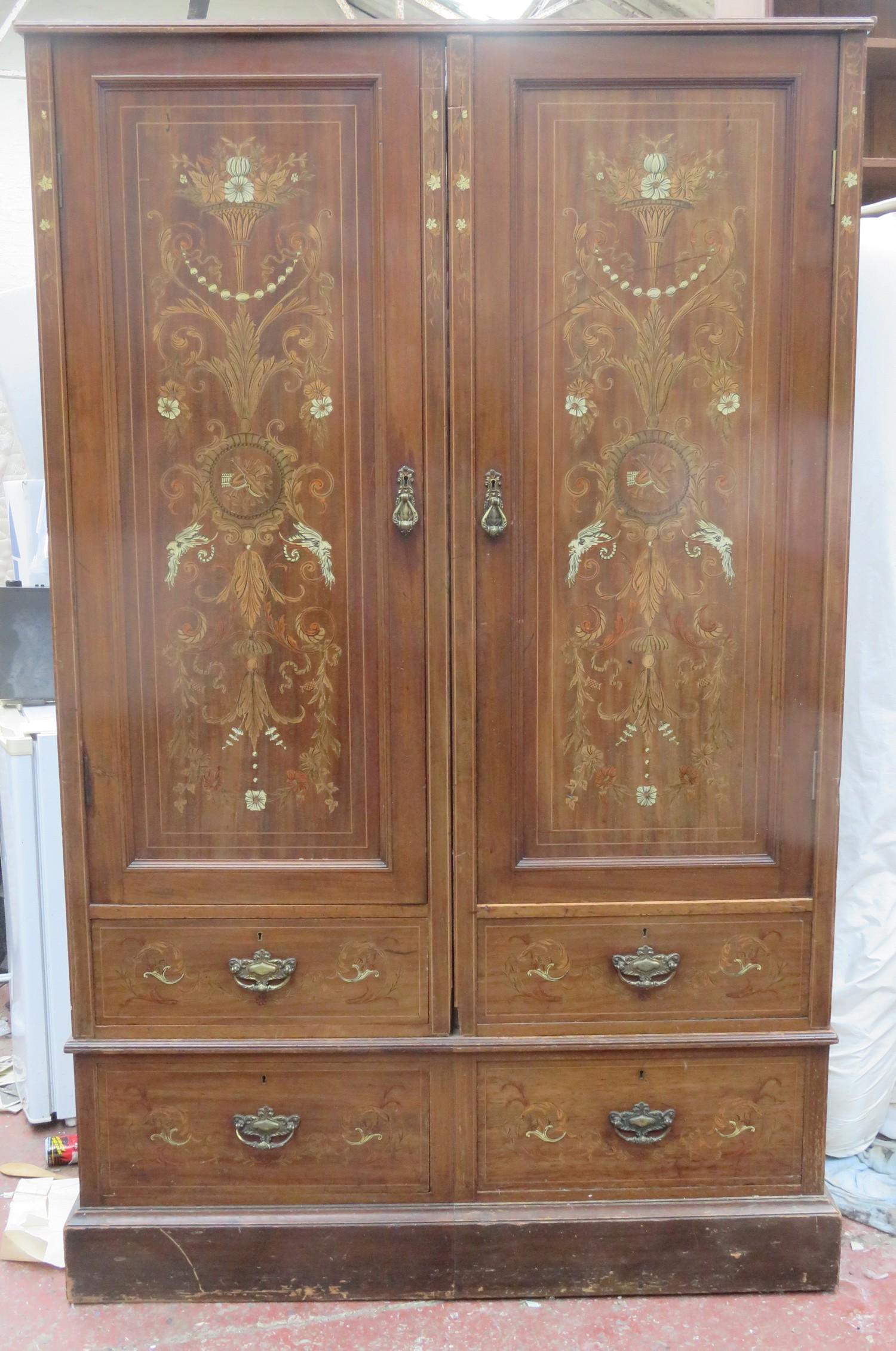 Victorian mahogany two door wardrobe, with ornately decorative ivory and treen inlay. Approx.