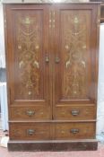 Victorian mahogany two door wardrobe, with ornately decorative ivory and treen inlay. Approx.