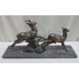 Impressive French Art Deco bronze figure group, depicting a galloping deer and fawn, mounted on