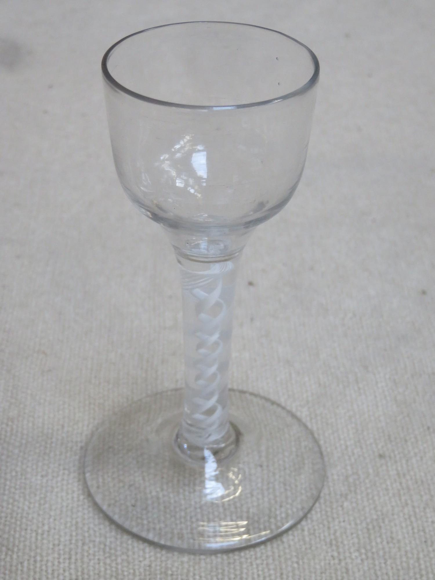 18th / 19th century wine glass, with air twist stem. Approx. 12.5cms height.