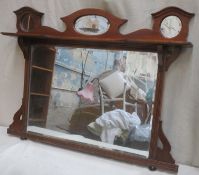 Arts and crafts style mahogany framed bevelled overmantle mirror. Approx. 86cms H x 112cms W.