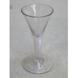 18th / 19th century trumpet form wine glass, with air twist stem. Approx. 12.5cms height.