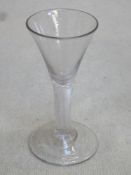 18th / 19th century trumpet form wine glass, with air twist stem. Approx. 12.5cms height.