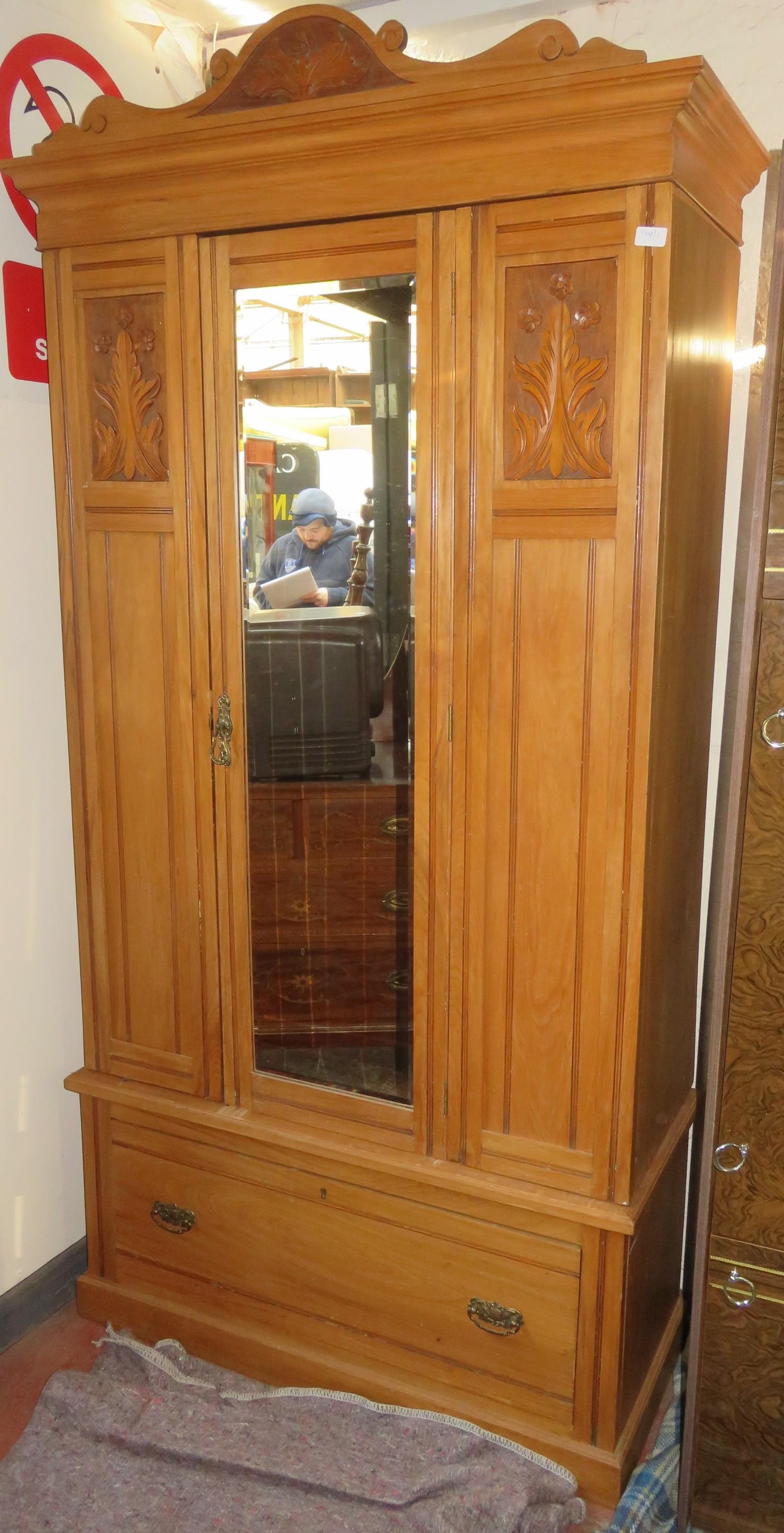 Carved fronted single door mirrored wardrobe. Approx. 207cm H x 106cm W x 46cm D