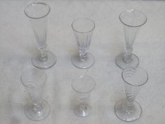 Parcel of six 18th / 19th century conical drinking glasses, various sizes, including two wrythen